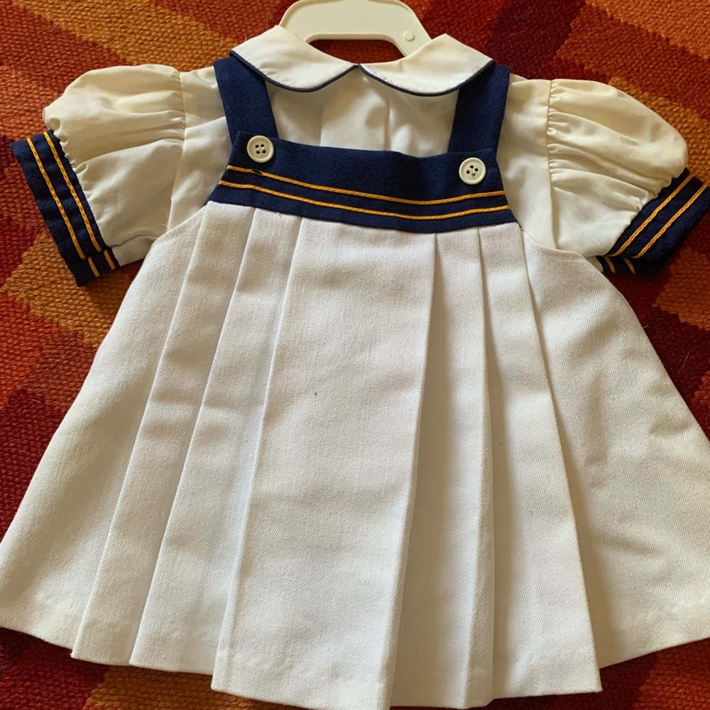 White and Navy Baby Dress with Gold Accents